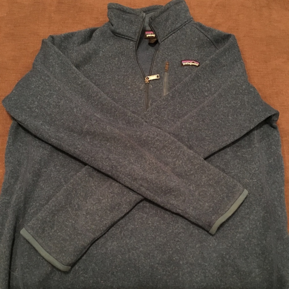 A men’s large brand new Patagonia. It is blue